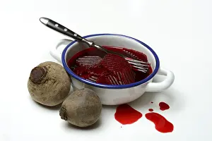 Root Vegetable Recipes Prints: Sliced pickled beetroot with peel and fork