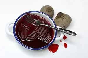 Leafy Green Vegetables Prints: Sliced pickled beetroot with peel and fork