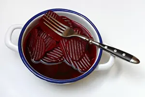 Root Vegetable Prints: Sliced pickled beetroot with peel and fork