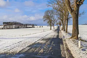Deserted Snowy Landscape Prints: Slippery road surface in winter