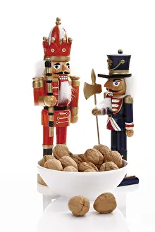 Still Life Studio Shots Prints: Small bowl of walnuts with nutcracker figures