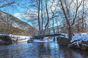 Deserted Waterfront Europe Prints: Small bridge over stream, Winter