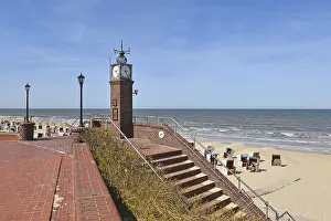 East Frisian Islands Prints: Small clock tower and steps at the beach