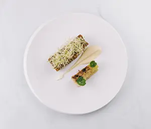 Minimalist Food Photography Prints: Two small courses are presented on a white plate