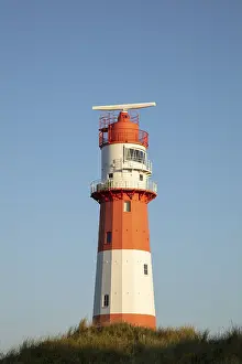 Atmospheric Lighthouse Scene Prints: Small lighthouse in the evening light