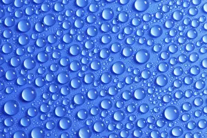 Clear Water Reflections Prints: Many small water drops on a blue surface