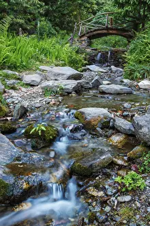 Mountain Stream Landscape Prints: Small waterfall on mountain stream with small bridge