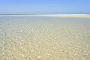 Juist Island Beach Prints: Small waves with light reflections