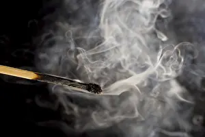 Studio Shot Of Smoke Prints: Smoking match