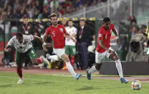 Prints of Sofia, Bulgaria - 14 October 2019: Marcus Rashford (R) and Ben Chilwell (C) are seen in action against Bulgarian football player during Bulgaria vs England match part of 2020 European Qualifier Sofia Prints: Sofia, Bulgaria - 14 October 2019 Football Print