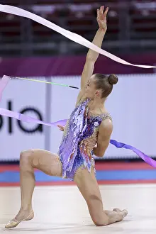 Prints of Sofia, Bulgaria - 27 March, 2021: Ekaterina Vedeneeva of Slovenia performs during the individual Ribbon final at the 2021 Rhythmic Gymnastics Sofia World Cup, Sofia, Bulgaria Sofia Prints: Sofia, Bulgaria - 27 March: Rhythmic Gymnastics Print