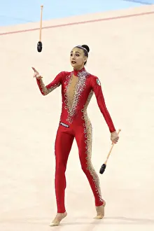 Prints of Sofia, Bulgaria - 31 March, 2018: Alessia Russo Italy performs with clubs during Rhythmic Gymnastics World Cup Sofia 2018. Individual tournament Sport Prints: Rhythmic Gymnastics Print: Sofia, Bulgaria 2018