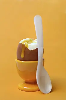 Deserted Breakfast Table Prints: Soft boiled breakfast egg in egg cup with spoon