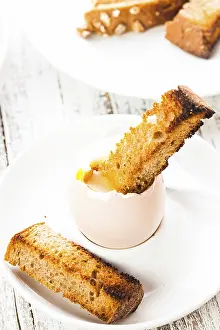 Appetizing Breakfast Dishes Prints: The soft-boiled egg in an eggcup with toasted bread