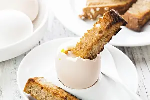 Savory Egg Recipes Prints: The soft-boiled egg in an eggcup with toasted bread