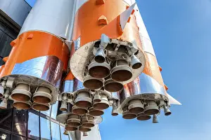 Deserted Night Shot Prints: Detail of space rocket engine against the blue sky