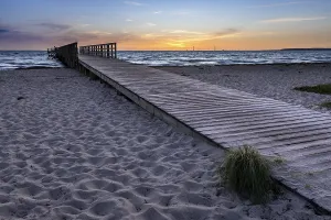 Deserted Beach Scandinavia Prints: Spacious, empty beach with a pier