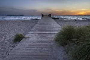 Northern European Beaches Prints: Spacious, empty beach with a pier
