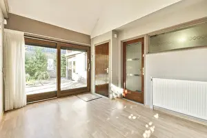 Minimalist Interior Design Prints: A spacious interior featuring large windows that invite ample natural light