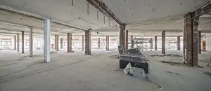 Construction Site Development Prints: A spacious, empty room under construction
