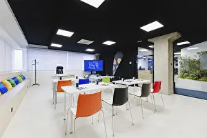 Modern Training Room Prints: A spacious training room featuring a large screen