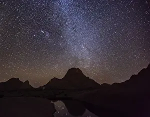 Deserted River Scene Prints: Spitzkoppe in front of a starry sky