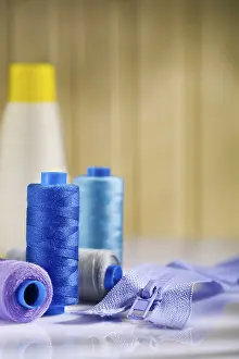 White Table Studio Shot Prints: Spools and zip on white table