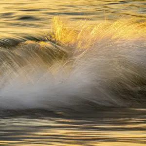 Beach Sunset Prints: Spray, waves on the beach, sunset