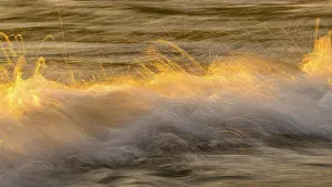 Beach Sunset Prints: Spray, waves on the beach, sunset