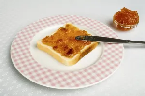 Homemade Breakfast Ideas Prints: Spread jam on bread with knife