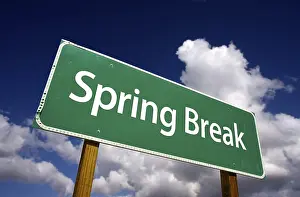 Christian Tradition Picture Prints: Spring break road sign with dramatic clouds and sky