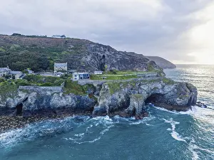 Steep Coastline UK Prints: St Agnes Beach and cliffs from a drone