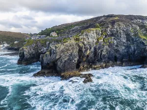 Deserted Beach In Cornwall Prints: St Agnes Beach and cliffs from a drone