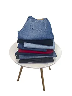 Casual Clothing Style Prints: A stack of blue, black, light blue