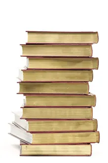 Deserted Book Pile Prints: Stack of books isolated on a white background