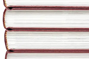 Deserted Book Pile Prints: Stack of books isolated on a white background