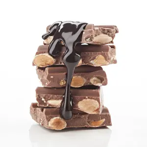 Gourmet Snacks Prints: A stack of chocolate bars with almonds