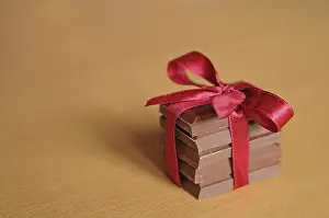 Milk Chocolate Bar Prints: Stack of chocolate tied with ribbon in a bow