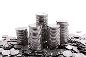 Stack Of Money Prints: Stack of coins isolated on a white background