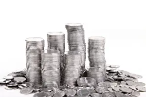 White Background Currency Prints: Stack of coins isolated on a white background