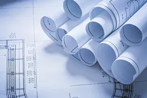Architecture Concept Prints: Stack of construction plans building and architecture concept