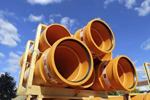 Environmental Damage Germany Prints: Stack of KG pipes on a construction site in the Mutterstadt development area