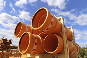 Mutterstadt Construction Site Prints: Stack of KG pipes on a construction site in the Mutterstadt development area