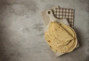 Mexican Tortillas Prints: A stack of Mexican tortillas, on a gray table
