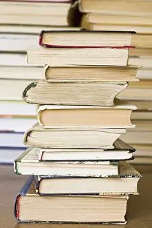 Deserted Book Pile Prints: Stack of old books at public library
