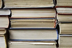 Old Books Prints: Stack of old worn books. Close-up view