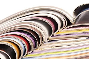 Environmental Conservation Photography Prints: Stack of open magazines