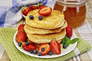 Homemade Pancake Recipes Prints: A stack of pancakes with strawberries