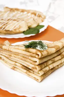 Nutritionally Balanced Food Prints: A stack of russian pancakes on a white plate