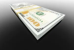 Stack Of One Hundred Dollar Bills Prints: Stack of ten thousand dollars of one hundred dollar bills on black reflective surface